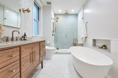 Bathroom - mid-sized transitional master white tile and porcelain tile porcelain tile, white floor and double-sink bathroom idea in Chicago with flat-panel cabinets, medium tone wood cabinets, white walls, an undermount sink, quartzite countertops, a hinged shower door, white countertops and a freestanding vanity