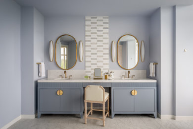 Bathroom - mid-sized contemporary master white tile gray floor and double-sink bathroom idea in Minneapolis with blue cabinets, blue walls, an undermount sink, quartz countertops, white countertops, flat-panel cabinets and a freestanding vanity