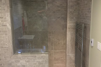 Bathroom - large craftsman master gray tile and ceramic tile ceramic tile and gray floor bathroom idea in Boston with a two-piece toilet, green walls, a pedestal sink and granite countertops