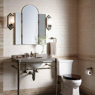 Inspiration for an industrial subway tile bathroom remodel in New York with a console sink