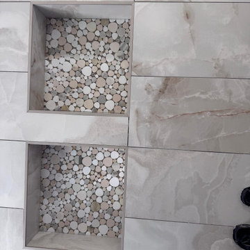 Curd-less walk-in shower; heated floors in bathroom + shower+bench LED