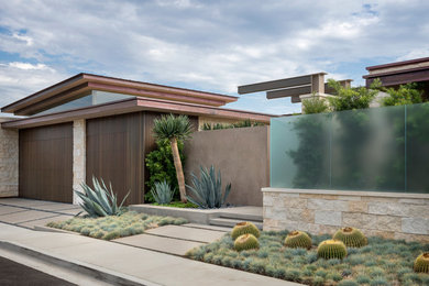 Contemporary exterior in Orange County with stone veneer.