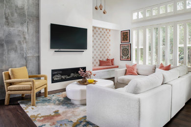 Example of an eclectic family room design in Denver
