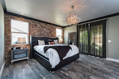 Bedroom - mid-sized industrial master dark wood floor and brown floor bedroom idea in Other with beige walls and no fireplace