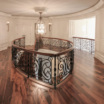 Project #74 | Circular Staircase with Hand-Forged Metal Panels