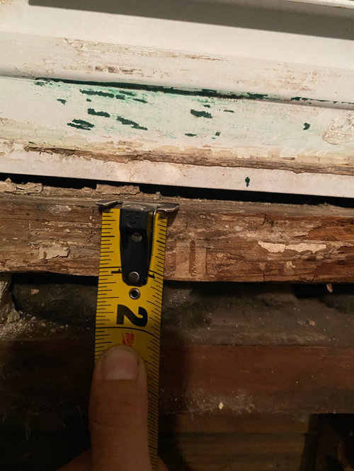 Rotten wood under my window, how do I fix it?