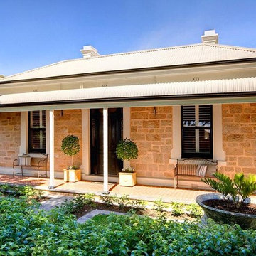 Double fronted victorian sandstone cottage