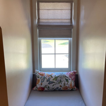 Cordless Roman shades and custom seat cushions for dormer windows