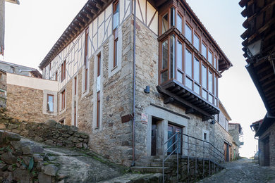 Rustic exterior home idea in Other