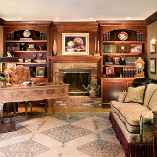 Photo of a traditional home office in Newark with a brick fireplace surround and a standard fireplace.