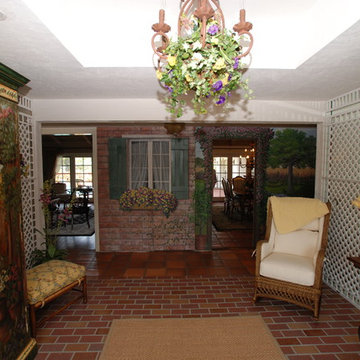 Garden Sunroom With Trompe-l'oeil Painting Walls & Trellis Over Mirror