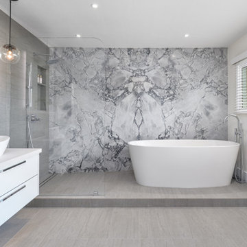 Contemporary Master Bathroom with striking features