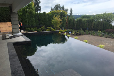 Example of a trendy home design design in Seattle