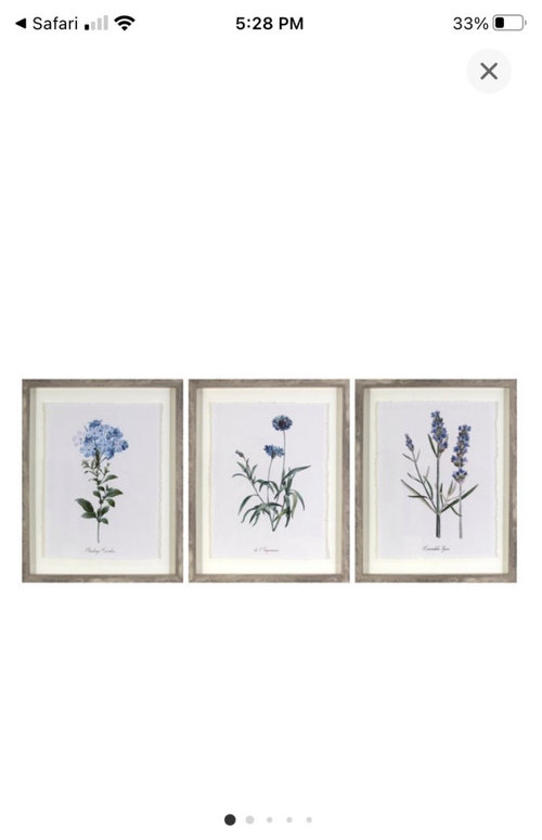 wall decor above a curved headboard