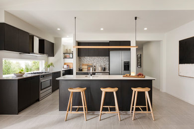 Inspiration for a scandinavian l-shaped kitchen in Central Coast with an undermount sink, flat-panel cabinets, black cabinets, window splashback, stainless steel appliances, with island, beige floor and white benchtop.