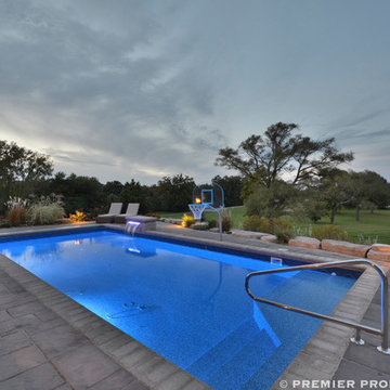 Pool, paver pool deck, custom bar: Outdoor Living in Indiana