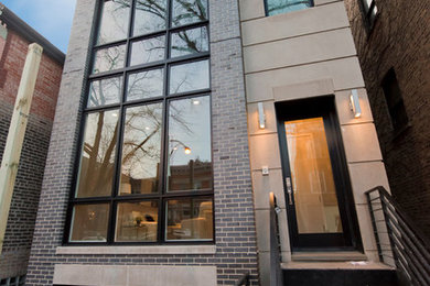 Inspiration for a contemporary three-story exterior home remodel in Chicago