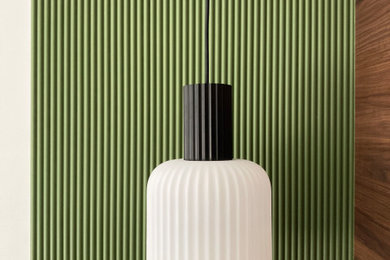 Example of a mid-sized trendy master light wood floor, beige floor and wood wall bedroom design in Nantes with green walls