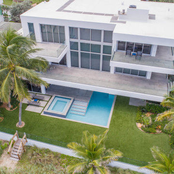 Custom Swimming Pool & Spa That Goes Underneath Part of the The House