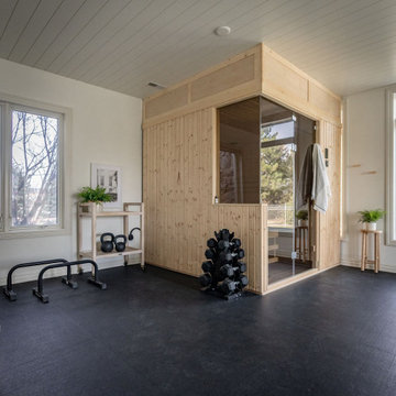 Home Gym with Sauna by KH Interiors