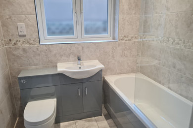 This is an example of a beach style bathroom in Dorset.