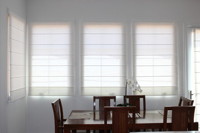 Dining room - contemporary dining room idea in Orange County with white walls and no fireplace
