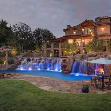 Multi-Level Pool with Rope Swing, Sunken Fire Pit, Waterfalls & Swim Up Bar