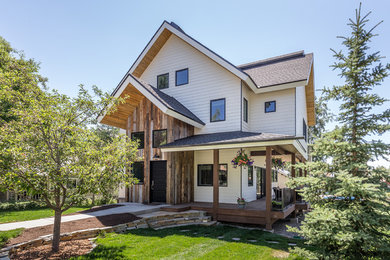 Country white three-story mixed siding exterior home idea in Denver