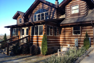 Rustic exterior home idea in Other