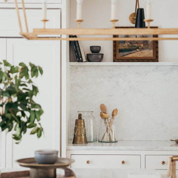 Lakeside Estates Modern Transitional Kitchen Utilizes White Paint with White Oak