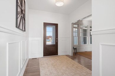 Entryway - shabby-chic style entryway idea in Other