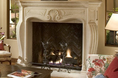 Inspiration for a large timeless enclosed light wood floor family room remodel in Phoenix with beige walls, a standard fireplace and a stone fireplace