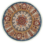 Bareens Designer Rugs - Southwestern Khurgeen Therese Blue/Red Wool Round - 4'8'' x 4'9'' - Designed with a mesmerizing intricate transitional and geometric motif this glorious hand knotted rug made with handspun Ghazni wool is a masterpiece that will fill any space with sophistication and grace. Hand knotted by skilled artisans in an exhilarating color pallet with an elaborate design, this masterpiece features luxurious hand spun wool with all vegetable dyes to add comfort and style to your decor. The design, color, and beautiful chromatic composition with a sheen in transitional and geometric designs, exude beauty, elegance and quality make this rug an extraordinarily opulent center piece for your living space. The intricate designs known as Khurgeen, Khorgeen or Khorjin range are inspired by the patterns from ancient tribal bags. An infusion of bold, saturated color gives this traditional hand-knotted rug a fresh perspective and modern appeal. Most desired due to its versatility in design and affordability this handmade rug is in a compelling focal point in any living area.