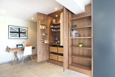 a beautiful mixture of display and storage cabinetry