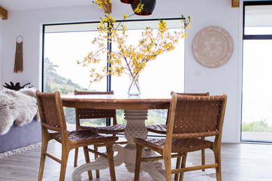 Beach style dining room in Auckland.