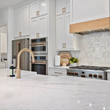 Modern Lakeside Farmhouse Kitchen with Marble Countertop and Natural Wood Range