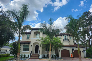 Island style exterior home photo in Tampa