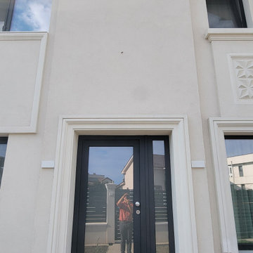 Profiled frame around the entrance door