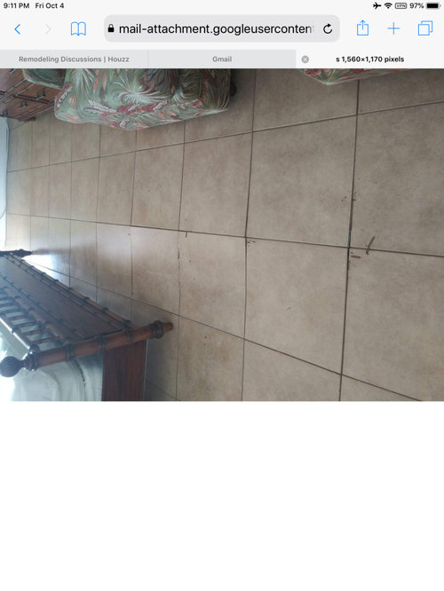 Buckled tiles, is this typical