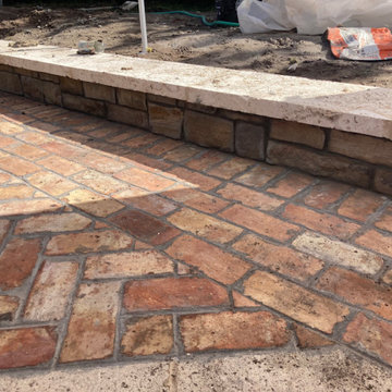 Jupiter Island Chicago Brick driveway with Precast boarders. Stone Faced Home