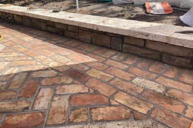 Jupiter Island Chicago Brick driveway with Precast boarders. Stone Faced Home