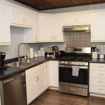 White Farmhouse Kitchen Featuring Mullion Doors. Baileytown USA