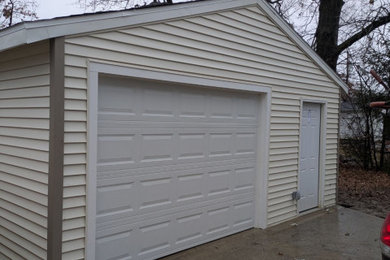 Example of a detached garage design in Cleveland