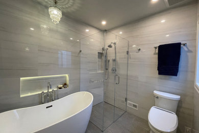 Inspiration for a mid-sized transitional master white tile and porcelain tile porcelain tile, gray floor and single-sink bathroom remodel in San Francisco with flat-panel cabinets, dark wood cabinets, a bidet, gray walls, an undermount sink, quartz countertops, a hinged shower door, white countertops, a niche and a floating vanity