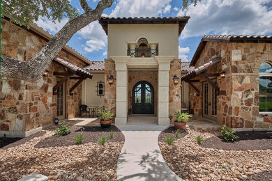 Tuscan exterior home photo in Austin