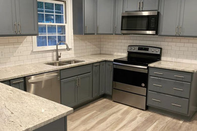 Home design - mid-sized transitional home design idea in Other