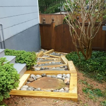 Exterior stairs with underground drainage system.