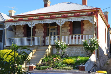 This is an example of a mid-sized traditional one-storey exterior in Perth.