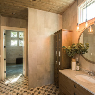 Farmhouse master gray tile and ceramic tile cement tile floor and multicolored floor bathroom photo in Austin with an undermount sink, marble countertops, furniture-like cabinets, medium tone wood cabinets and gray countertops