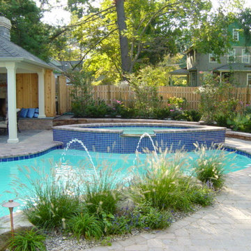 Raised spa faced with shiny blue tile